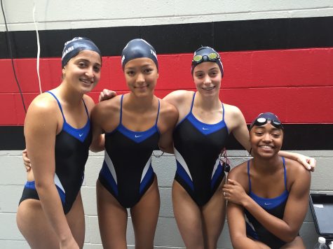 Members of the girls' swim team pose for a picture. Photo by Taylor Torgerson